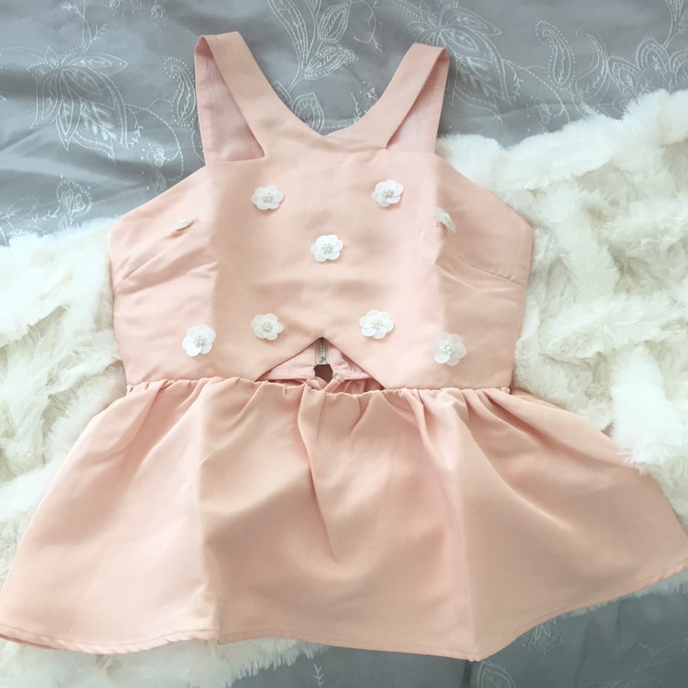 Pink peplum top